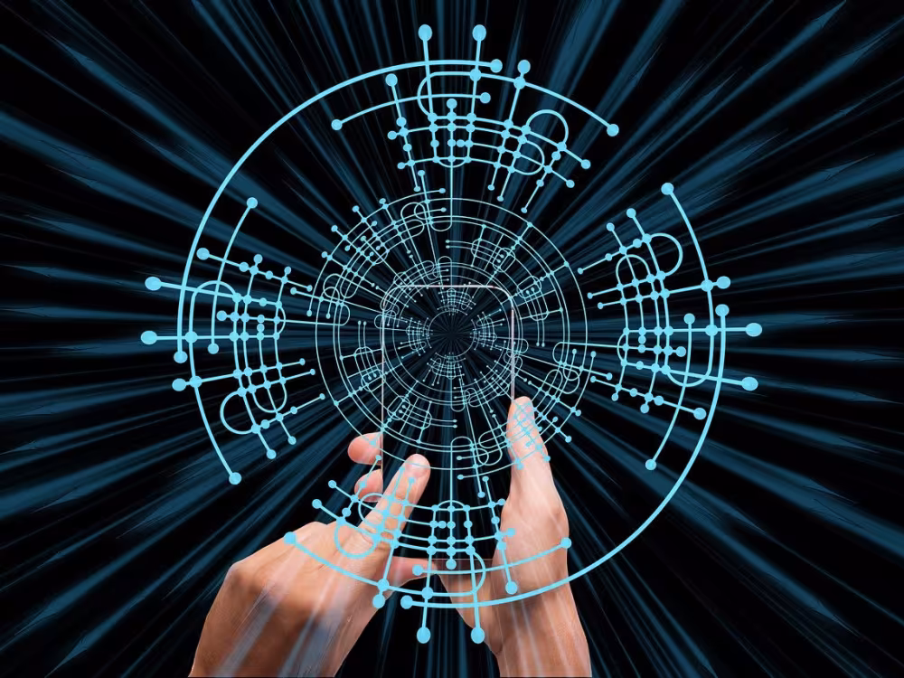 pair of hands surrounded by digital blue lines