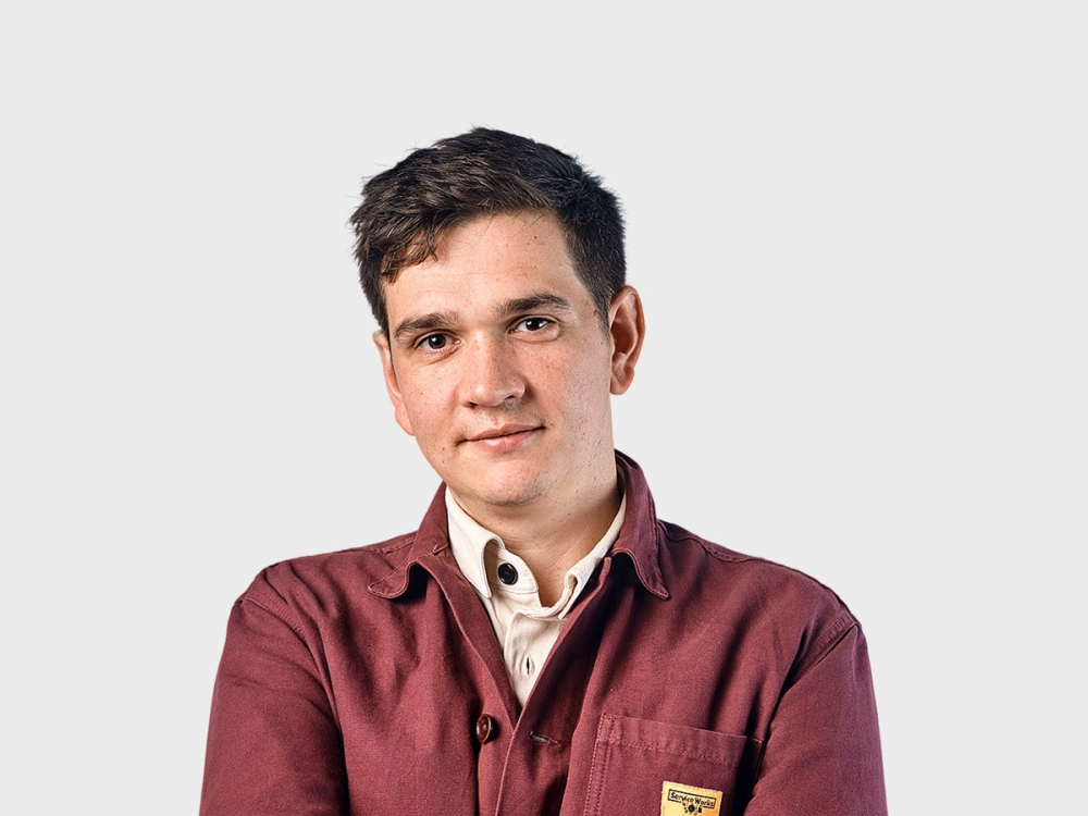 Person smiling at camera.