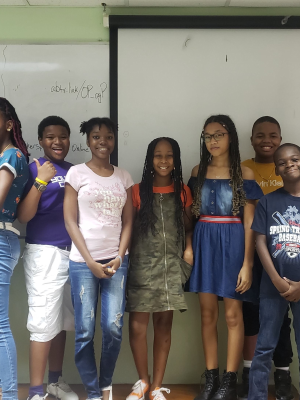 Line of young people from Jamaican school 
