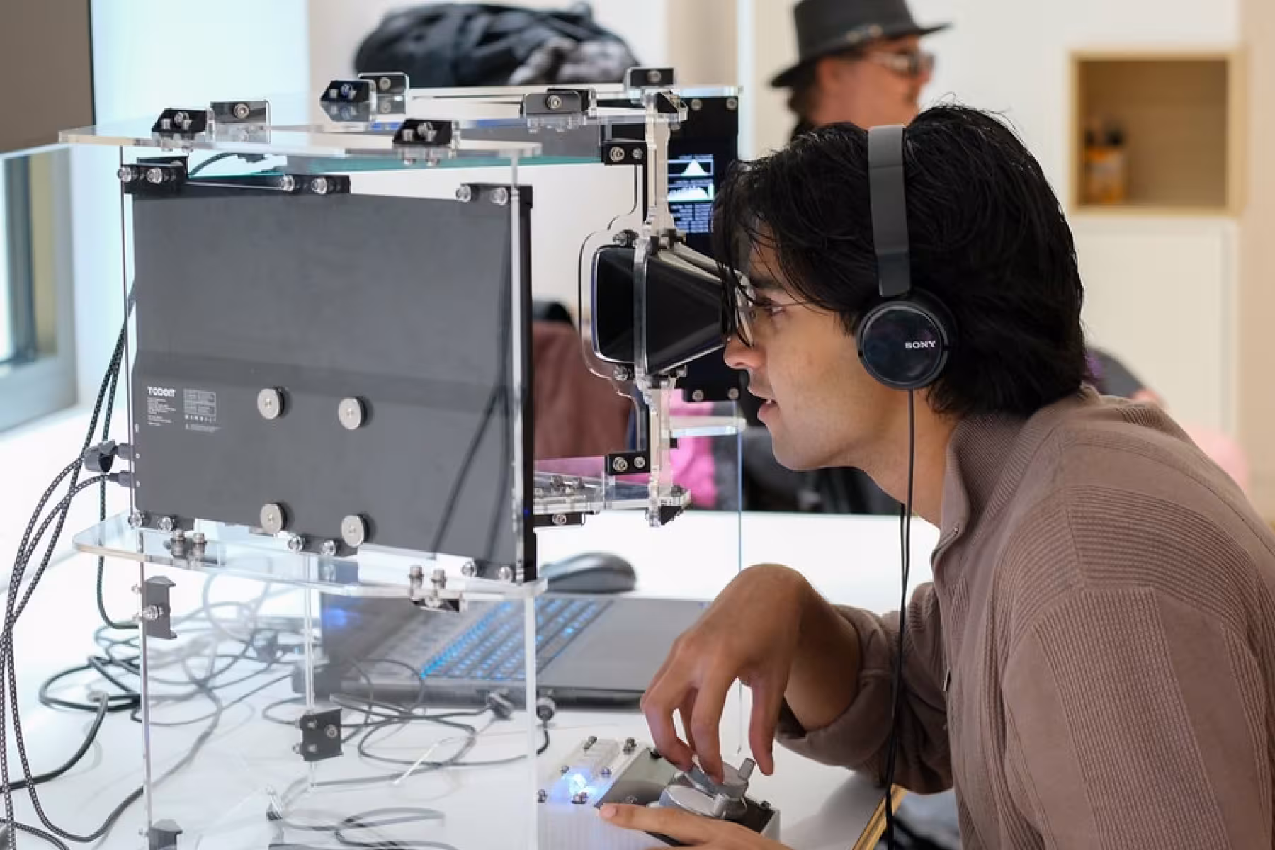 man looking at screens