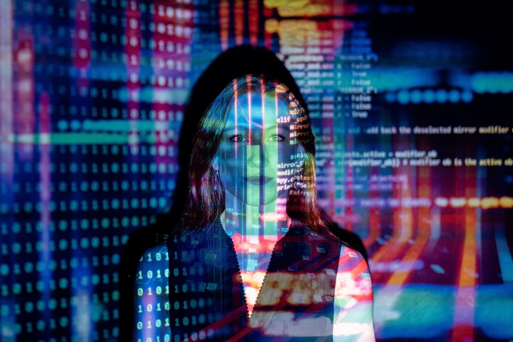 woman standing with colourful graphics across face